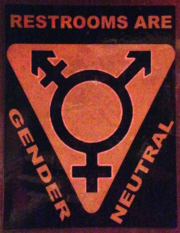 Ein Plakat mit der Aufschrift "Toiletten sind geschlechterneutral" betont die Bedeutung von Geschlecht in der Toilette.