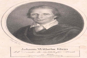 Schwarzes und weißes Porträt von Johann Wilhelm Klein, Direktor des Instituts für Blinde in Wien, der einen weißen Hemdkragen trägt und ernst dreinschaut, mit deutschem Text unten.